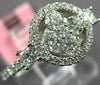 ESTATE .82CT DIAMOND 18K WHITE GOLD 3D ROUND & PRINCESS 4 STONE FLOWER HALO RING