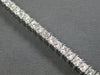 WIDE 6.57CT DIAMOND 14KT WHITE GOLD 3D PRINCESS PRONG INVISIBLE TENNIS BRACELET