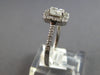 ESTATE .60CT DIAMOND 14KT WHITE GOLD ROUND & CUSHION HALO SQUARE ENGAGEMENT RING