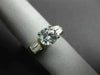 ESTATE .42CT BAGUETTE & ROUND DIAMOND & CUBIC ZIRCONIUM PLATINUM ENGAGEMENT RING