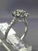 WIDE .89CT ROUND & BAGUETTE DIAMOND 18KT WHITE GOLD OCTAGON FLOWER CLUSTER RING