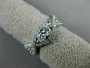 ESTATE .54CT DIAMOND 14KT WHITE GOLD 3D TWO STONE CRISS CROSS INFINITY LOVE RING