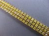 EXTRA LARGE 23.71CT FANCY YELLOW DIAMOND 18KT YELLOW GOLD 3 ROW TENNIS BRACELET