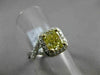 ESTATE 1.82CTW GIA FANCY YELLOW DIAMOND 18KT WHITE GOLD HALO ENGAGEMENT RING