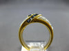 1.20CT DIAMOND & AAA SAPPHIRE 18KT YELLOW GOLD ROUND & BAGUETTE CRISS CROSS RING
