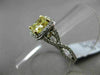 ESTATE 1.82CTW GIA FANCY YELLOW DIAMOND 18KT WHITE GOLD HALO ENGAGEMENT RING