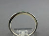 ESTATE .31CT DIAMOND & AAA EMERALD 18K WHITE GOLD ROUND CHANNEL ANNIVERSARY RING