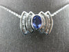 ESTATE 2.20CT DIAMOND & AAA TANZANITE 14K WHITE GOLD OVAL & BAGUETTE BOW PENDANT