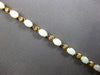 4.6CT DIAMOND & AAA OPAL 14KT YELLOW GOLD OVAL & ROUND ETERNITY BRACELET 28192