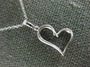 ESTATE .20CT DIAMOND 18KT WHITE GOLD 3D SIDEWAYS HEART FLOATING LOVE PENDANT