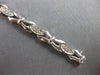 .59CT DIAMOND 14KT WHITE GOLD 3D ROUND 3 STONE XO FILIGREE LOVE TENNIS BRACELET