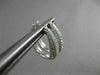 ESTATE .71CT DIAMOND 18KT WHITE GOLD CLASSIC ELONGATED PAVE OVAL HUGGIE EARRINGS