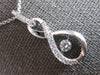 ESTATE .65CT DIAMOND 14KT WHITE GOLD SOLITAIRE DANCING DIAMOND FLOATING PENDANT