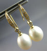 0.10CT DIAMOND & AAA SOUTH SEA PEARL 14KT YELLOW GOLD OPEN LEVERBACK FUN EARRINGS