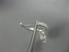 LARGE 14KT WHITE GOLD HUGGIE HANGING EARRINGS. 3D FLOWER OCTAGON DESIGN