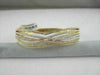 ANTIQUE WIDE DIAMOND 18K TRICOLOR GOLD MULTI ROW BANGLE