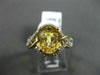ESTATE 3.09CT DIAMOND & EXTRA FACET YELLOW TOPAZ 14KT YELLOW GOLD INFINITY RING