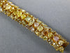 WIDE 25.2CT MULTI COLOR DIAMOND 18KT YELLOW GOLD GRADUATING LOVE TENNIS BRACELET