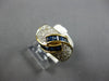 1.20CT DIAMOND & AAA SAPPHIRE 18KT YELLOW GOLD ROUND & BAGUETTE CRISS CROSS RING