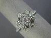WIDE .89CT ROUND & BAGUETTE DIAMOND 18KT WHITE GOLD OCTAGON FLOWER CLUSTER RING