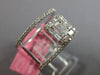 LARGE .76CT WHITE DIAMOND 18KT WHITE GOLD 3D ROUND & BAGUETTE ANNIVERSARY RING