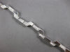 ESTATE .80CT DIAMOND 14KT WHITE GOLD ROUND GEOMETRICAL TRAPEZOID TENNIS BRACELET