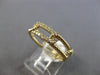 .16CT DIAMOND 14KT YELLOW GOLD 3D ROUND CLASSIC RECTANGULAR LOVE KNOT FUN RING
