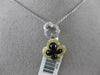 ESTATE .23CT DIAMOND & ONYX 14KT TWO TONE GOLD 3D DOUBLE FLOWER FLOATING PENDANT