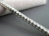 ESTATE WIDE 6.65CT PRINCESS CUT DIAMOND 18KT WHITE GOLD CLASSIC TENNIS BRACELET