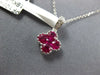 SMALL .78CT DIAMOND & AAA RUBY 18KT WHITE GOLD INVISIBLE 4 LEAF CLOVER PENDANT
