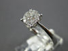 ESTATE .34CT DIAMOND 18KT WHITE GOLD ROUND 3D CLUSTER INVISIBLE ENGANGEMENT RING