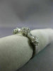 ESTATE .85CT ROUND & BAGUETTE DIAMOND 18KT WHITE GOLD 3 FLOWER ANNIVERSARY RING