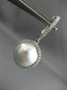 ESTATE .64CT DIAMOND & AAA SOUTH SEA PEARL 18KT WHITE GOLD HALO HANGING EARRINGS