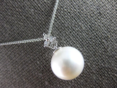 .06CT DIAMOND & AAA SOUTH SEA PEARL 14KT WHITE GOLD FLOWER TRILLION FUN PENDANT
