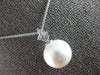 .06CT DIAMOND & AAA SOUTH SEA PEARL 14KT WHITE GOLD FLOWER TRILLION FUN PENDANT