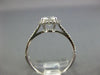 ESTATE .96CT DIAMOND 14KT WHITE GOLD 3D ROUND HALO CLASSIC ENGAGEMENT RING