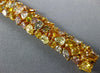 WIDE 28.14CT MULTI COLOR DIAMOND 18K YELLOW GOLD GRADUATING LOVE TENNIS BRACELET