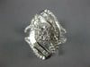 LARGE .77CT DIAMOND 14KT WHITE GOLD ROUND & BAGUETTE FLOWER LEAF ENGAGEMENT RING