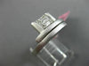 ESTATE WIDE 18KT WHITE GOLD FUN RING. 3D CLUSTER CRISS CROSS ETOILE DESIGN