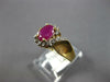 ESTATE 1.10CT DIAMOND & AAA RUBY 14KT YELLOW GOLD OVAL & ROUND FLOWER FUN RING