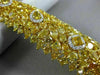 GIA LARGE 51.38CT WHITE & FANCY YELLOW DIAMOND 18KT YELLOW GOLD TENNIS BRACELET