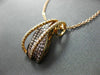 LARGE .75CT WHITE & PINK DIAMOND 18KT ROSE & BLACK GOLD CRISS CROSS WAVE PENDANT