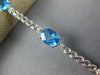8.14CT DIAMOND & AAA BLUE TOPAZ 14KT WHITE GOLD 3D OVAL & ROUND TENNIS BRACELET