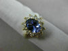 1.83CT DIAMOND & AAA OVAL TANZANITE 14KT YELLOW GOLD FLOWER HALO ENGAGEMENT RING
