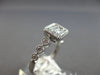 .41CT DIAMOND 14KT WHITE GOLD 3D ROUND & BAGUETTE INVISIBLE FILIGREE LOVE RING