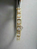 ANTIQUE WIDE 3.0CTW DIAMOND 18KT YELLOW GOLD BAGUETTE AND ROUND BANGLE