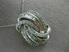 LARGE .75CT ROUND & BAGUETTE DIAMOND 14KT WHITE GOLD LOVE KNOT MULTI ROW PENDANT