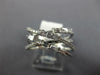 .68CT DIAMOND 14KT WHITE GOLD 3D ROUND & BAGUETTE MULTI ROW CRISS CROSS FUN RING