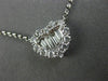 ESTATE .84CT ROUND & BAGUETTE DIAMOND 18KT WHITE GOLD 3D HEART LOVE NECKLACE