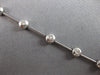 ESTATE .52CT DIAMOND 14K WHITE GOLD ROUND BEZEL BY THE YARD LOVE TENNIS BRACELET